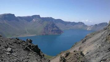 A mountainous landscape with a lake.