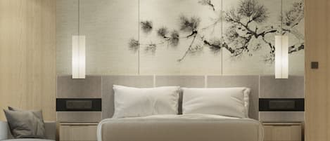 A modern bedroom with a large bed, two bedside tables, a nightstand, and a wall-mounted artwork.