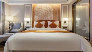 A hotel room with a large bed, two bedside lamps, a chair, and a large window.