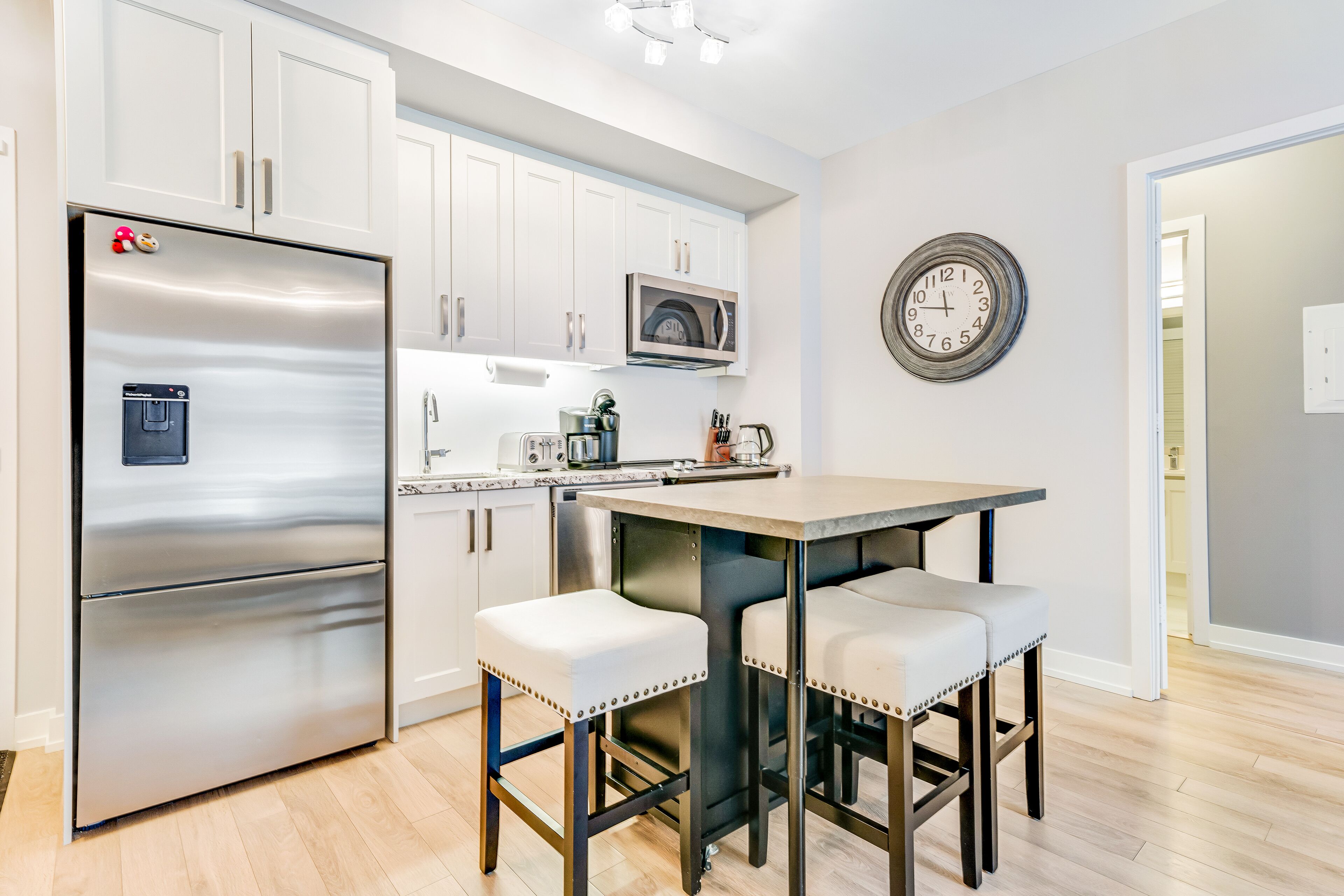 Lakefront property with patio, washer/dryer, pools, hot tub, & fitness room