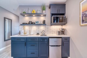 Fridge, microwave, stovetop, coffee/tea maker