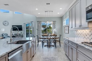 Fridge, microwave, oven, stovetop - Cinnamon Beach House 6BR-6Ba PrivatePool Hot Tub Steps to the Beach Sleeps 18 (Palm Coast)