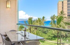 Outdoor dining - Maui Resort Rentals: Honua Kai Konea 448 – XL 1BR w/ Partial Ocean Views, Only 1 Stack Back from Oceanfront! (Lahaina)