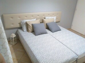 3 habitaciones, tabla de planchar con plancha, wifi y ropa de cama 
