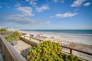 Enjoy breathtaking views of the beach and ocean from your balcony.