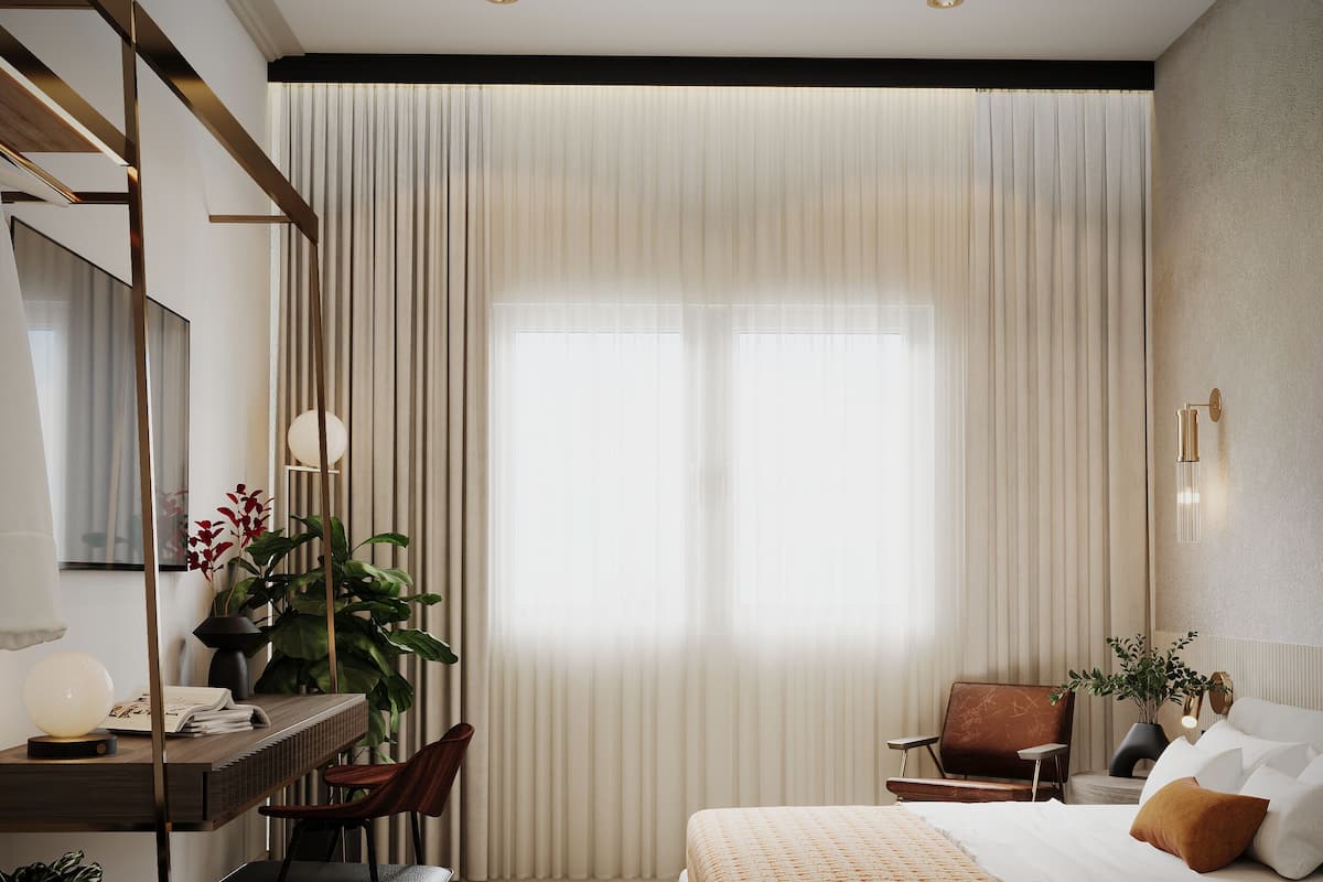 A modern hotel room with a large bed, a desk with a chair, a potted plant, and a large window with curtains.