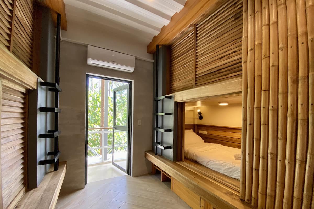 Premium bedding, individually furnished, laptop workspace