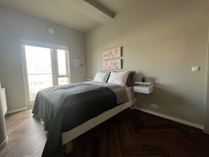 2 bedrooms, desk, iron/ironing board, travel crib