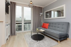 TV, offices - Charming Studio in Warsaw Center with Air Conditioning by Noclegi Renters (Warszawa)