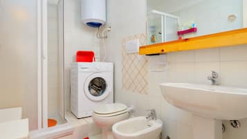 Shower, free toiletries, hair dryer, towels