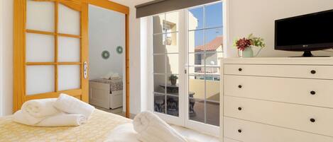 2 dormitorios, tabla de planchar con plancha, wifi gratis y ropa de cama