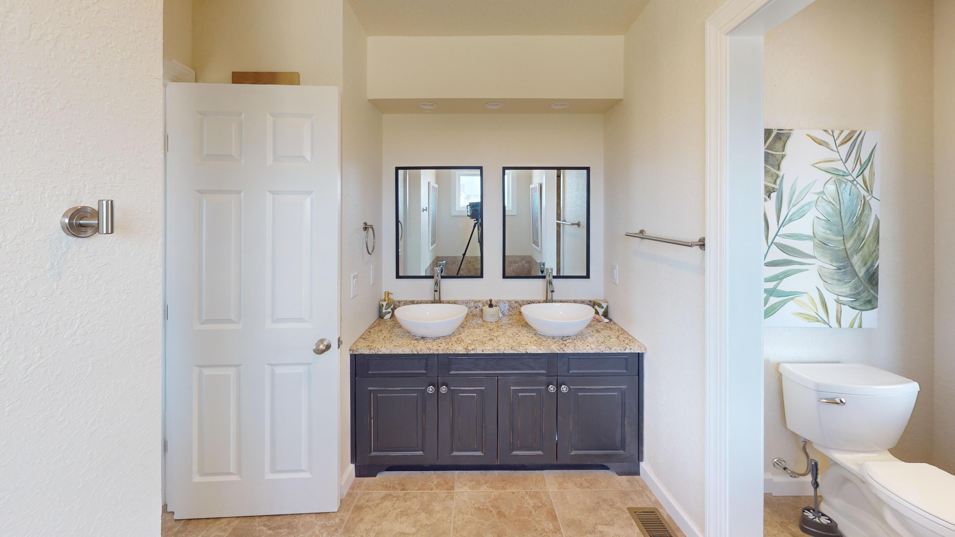 BR 2 bath with shower stall, tub, double vanity and toilet - BR 2 bath with shower stall, tub, double vanity and toilet at Memories vacation rental, Carova Beach 4x4 Northern Outer Banks NC