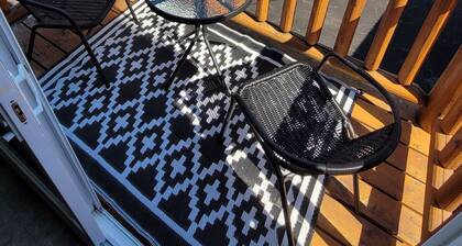 Modern Costa Del Sol Flat Overlooking Pokemouche River, with swimming off dock.