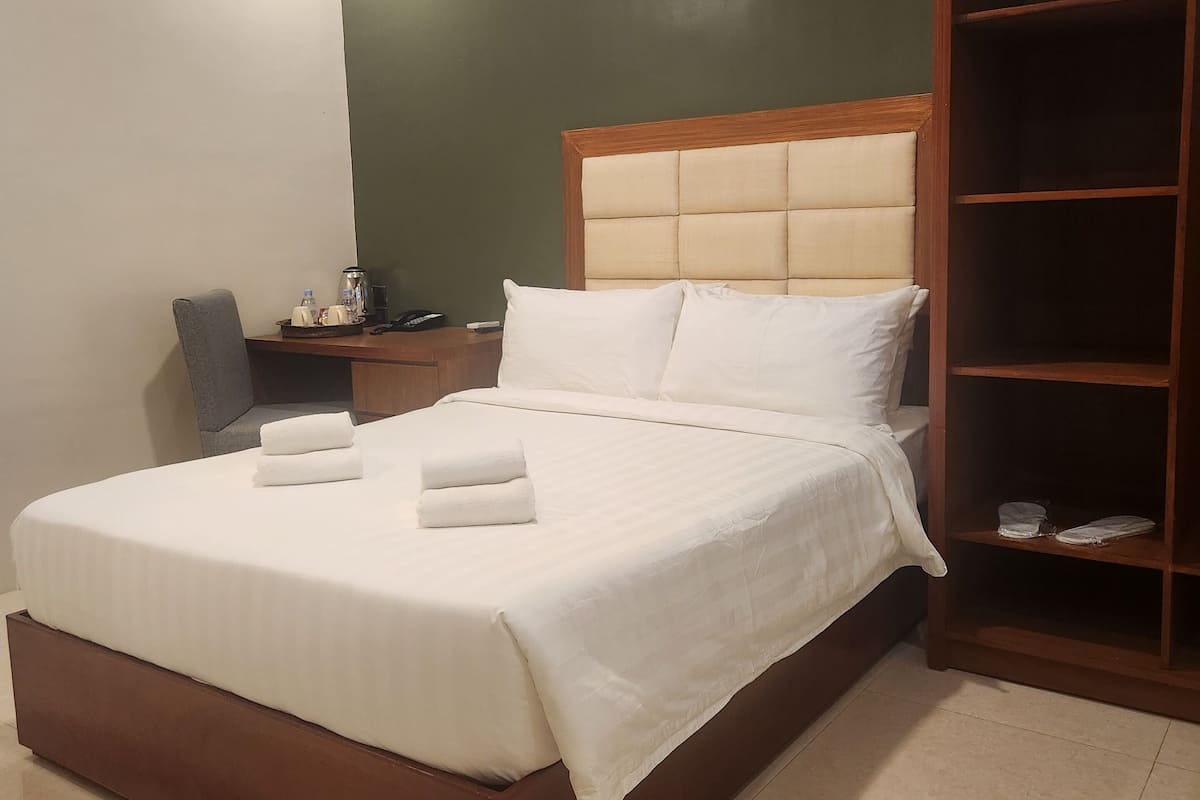 Senior Double Room | Desk, blackout drapes, iron/ironing board, free WiFi