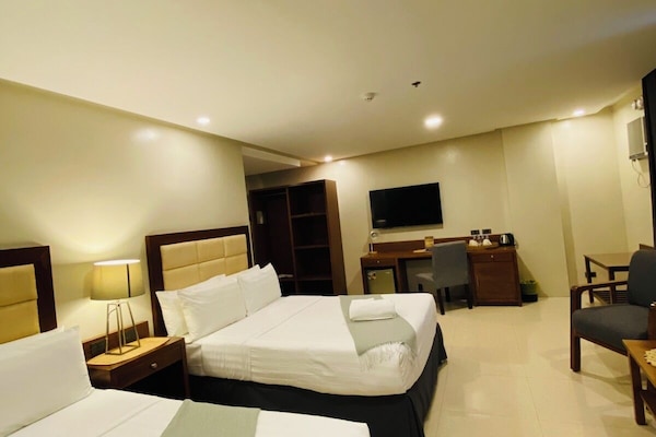 Family Quadruple Room | Desk, blackout curtains, iron/ironing board, free WiFi