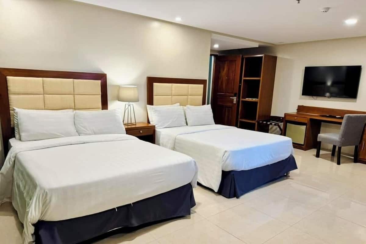 Family Quadruple Room | Desk, blackout drapes, iron/ironing board, free WiFi