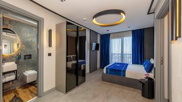 Premium bedding, Select Comfort beds, free minibar items, in-room safe