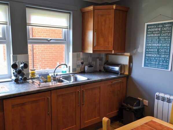 Dishwasher, high chair, cookware/dishes/utensils