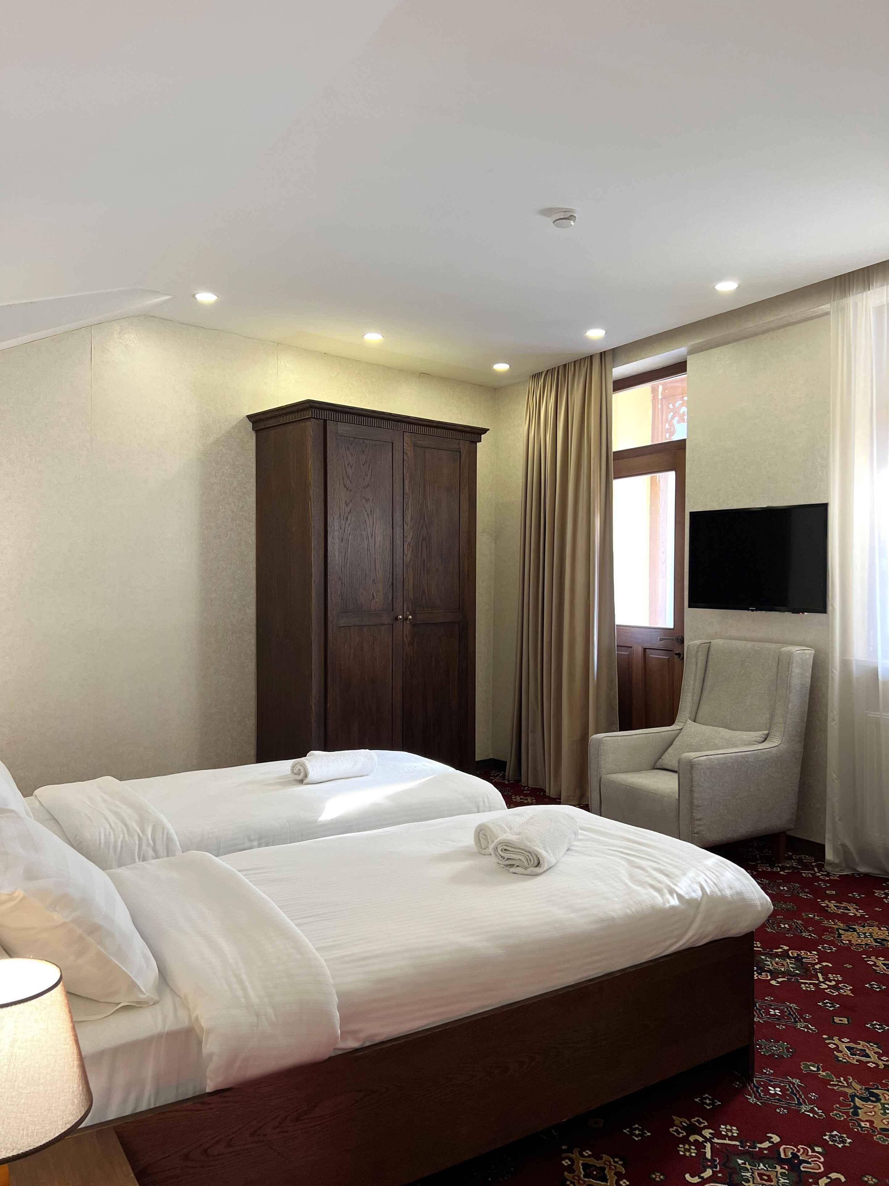 Premium bedding, down comforters, desk, laptop workspace