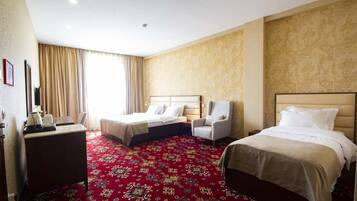 Premium bedding, down duvets, desk, laptop workspace