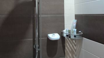 Separate bathtub and shower, hair dryer, bidet, towels