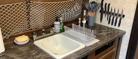 Fridge, microwave, stovetop, coffee/tea maker