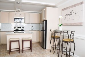 Fridge, microwave, oven, stovetop - Modern Paradise Island Condo near Atlantis resort & beach (Nassau)