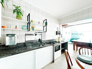 Deluxe Villa | Private kitchen | Full-size fridge, microwave, oven, stovetop