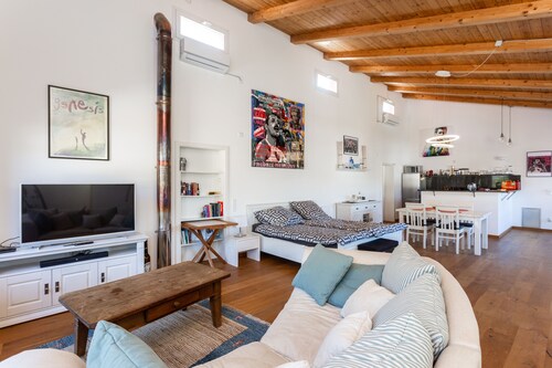 Large loft apartment in a quiet area only 8 minutes to the beach promenade