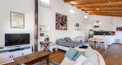 Large loft apartment in a quiet area only 8 minutes to the beach promenade