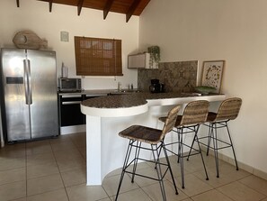 Fridge, oven, electric kettle, toaster