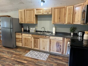 Fridge, microwave, oven, stovetop - Calla Lily #2 - Oneonta Apartment close to downtown - 1 of 2 units (Oneonta)