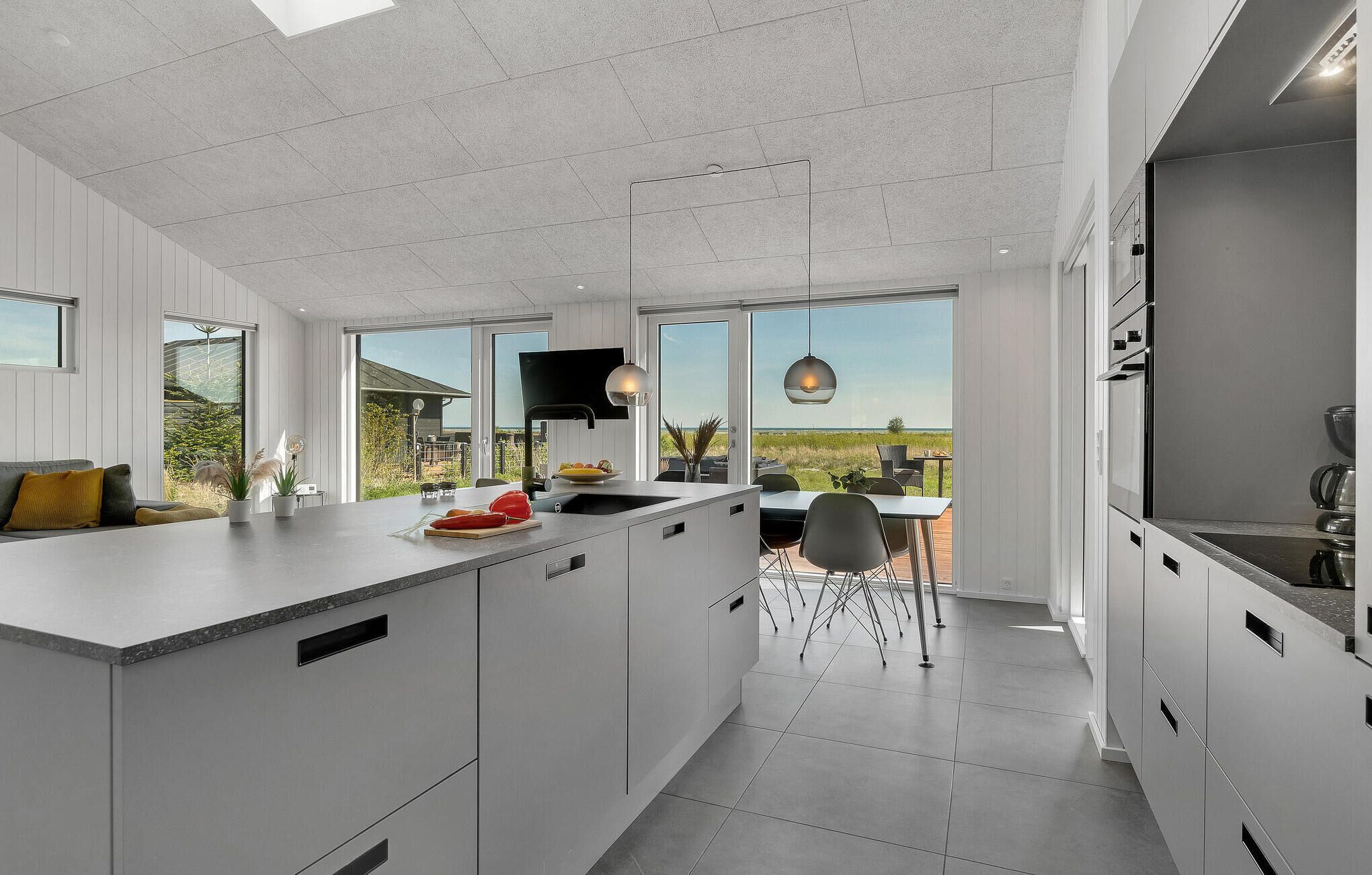 Fridge, stovetop, dishwasher, coffee/tea maker