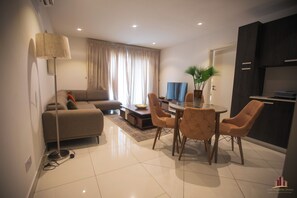 Executive Apartment | Living area | TV - The Lennox Abode (Accra)