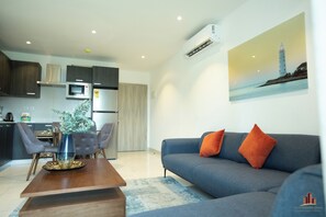 Executive Apartment | Living area | TV - The Lennox Abode (Accra)