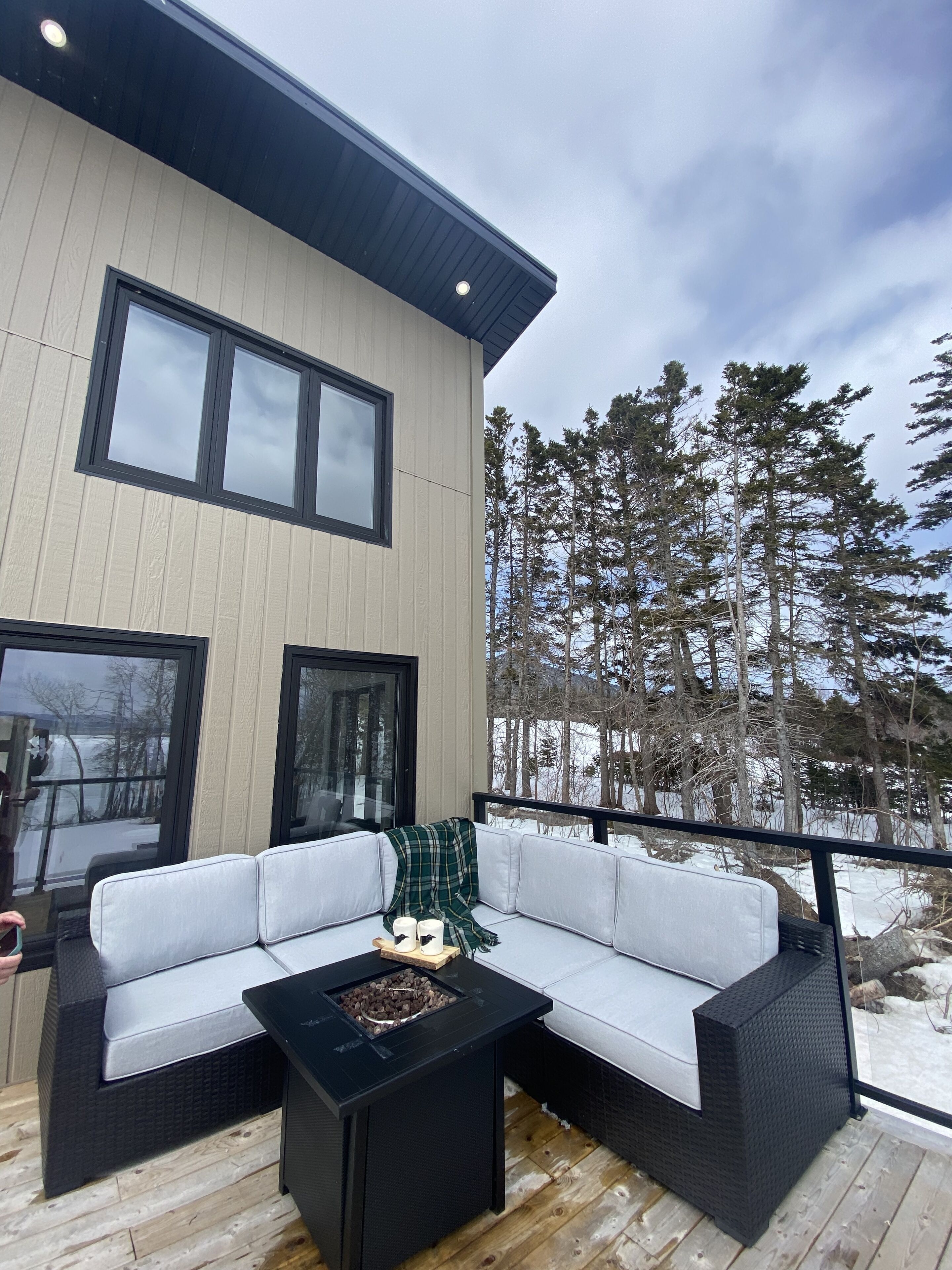 Relax on the generous deck with a coffee or glass of wine