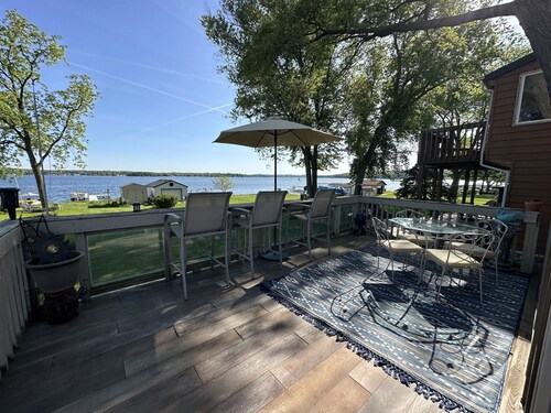 Wide open lake views and large flat front yard