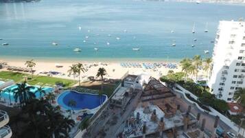 Beach nearby, sun loungers