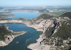 Surrounded by rugged terrain, this serene lake offers a peaceful escape.