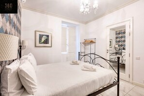 1 bedroom, desk, iron/ironing board, travel cot