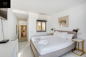 2 bedrooms, desk, iron/ironing board, travel crib