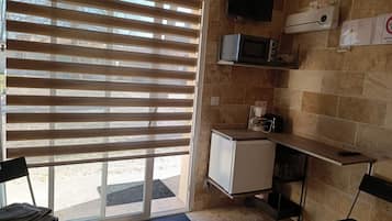 Fridge, microwave, coffee/tea maker, toaster