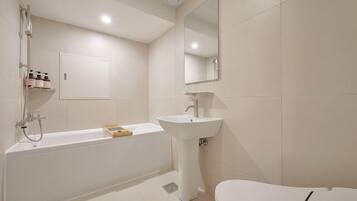 Hair dryer, bathrobes, towels, shampoo