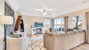 Smart TV, fireplace, books