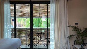 Deluxe Double Room, 1 King Bed, Garden View | Free WiFi, bed sheets - Suncloud Hotel Koh Samet (Rayong)