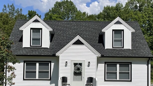 A two-story house with a front porch, a garage, and a number '2840' on the steps. - Spacious cottage by lake & walking trails, 1 mile from downtown Shipshe. (Shipshewana)
