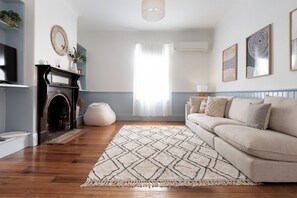 TV, fireplace, books