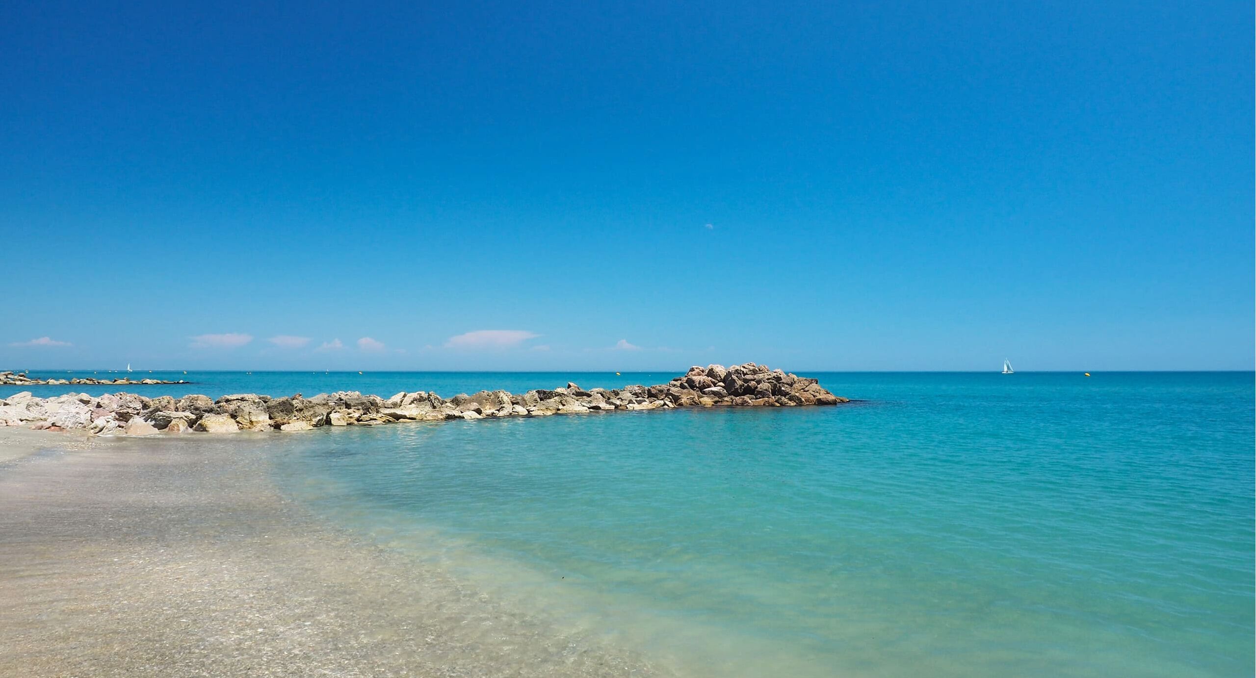 On the beach, sun loungers