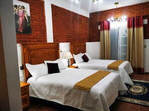 Colchones con pillow-top, minibar y espacio para trabajar con laptop