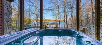 Inviting waterfront cabin with hot tub, kayaks, and beautiful sunsets